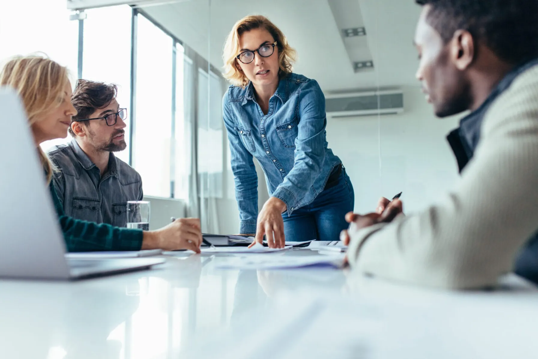 60b74e61-businesswoman-leading-business-presentation-903715608-1440x960-1