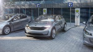 8cf53131-electric-suv-of-the-future-charging-electricity-with-public-charger-1126139719