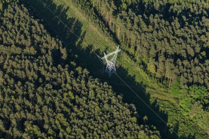 Aerial-view-of-electrical-wires-large-scale-power-energy-tower-497627242-1-scaled-1