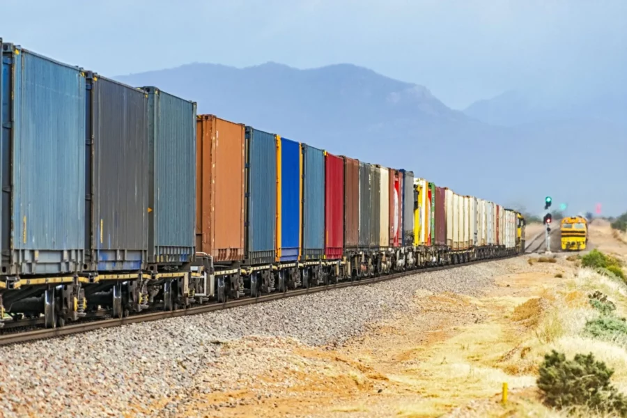 a5d00db7-colourful-container-freight-train-reversed-1440x960-1