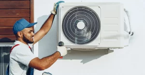 repairman-uniform-installing-outside-unit-air-conditioner-3