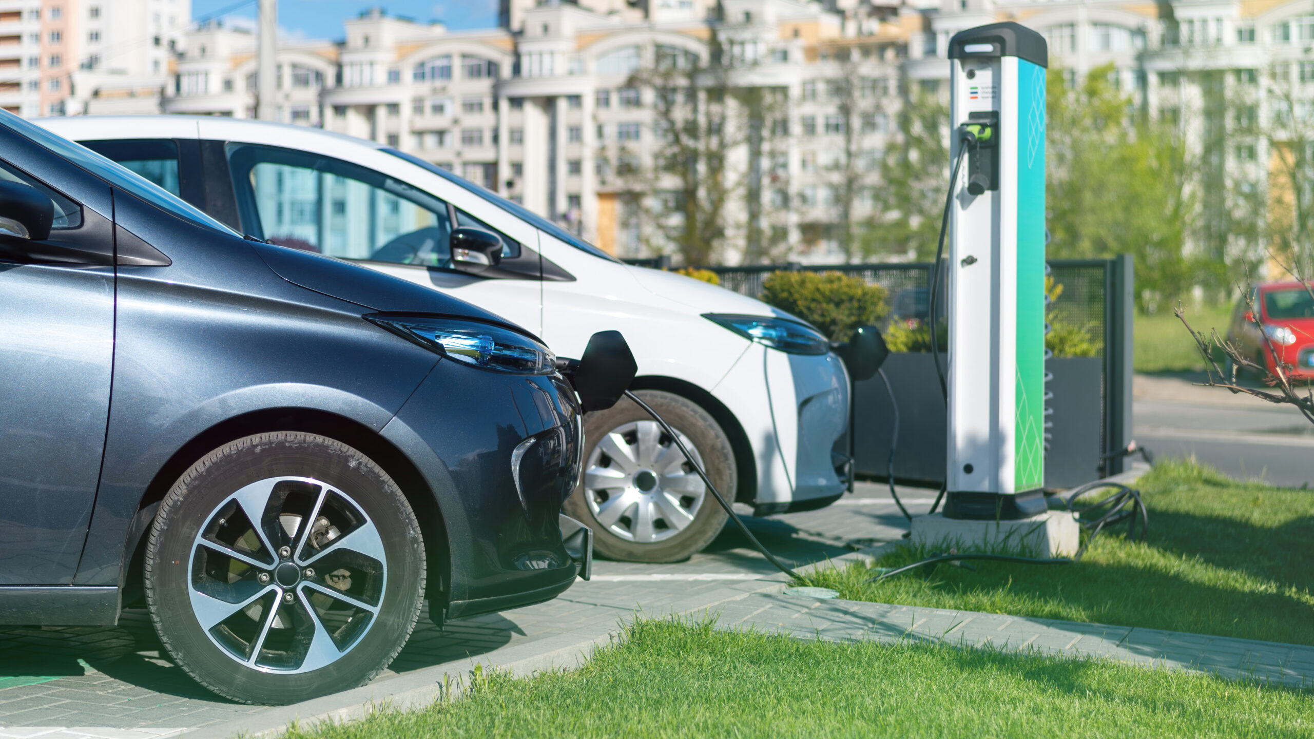 two-charging-electric-cars-charge-station-city-11-scaled-1