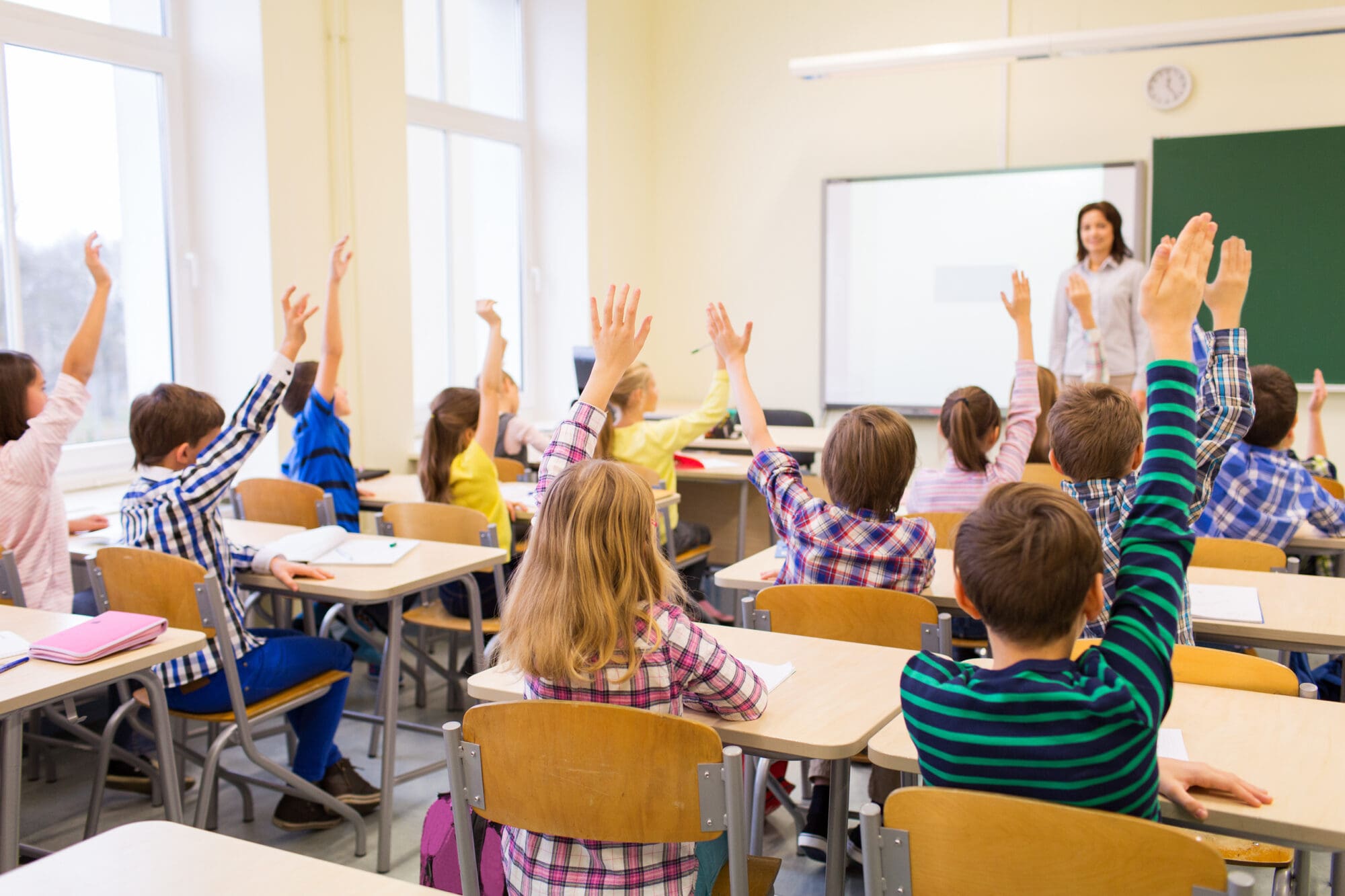 6106c655-kids-in-classroom-min