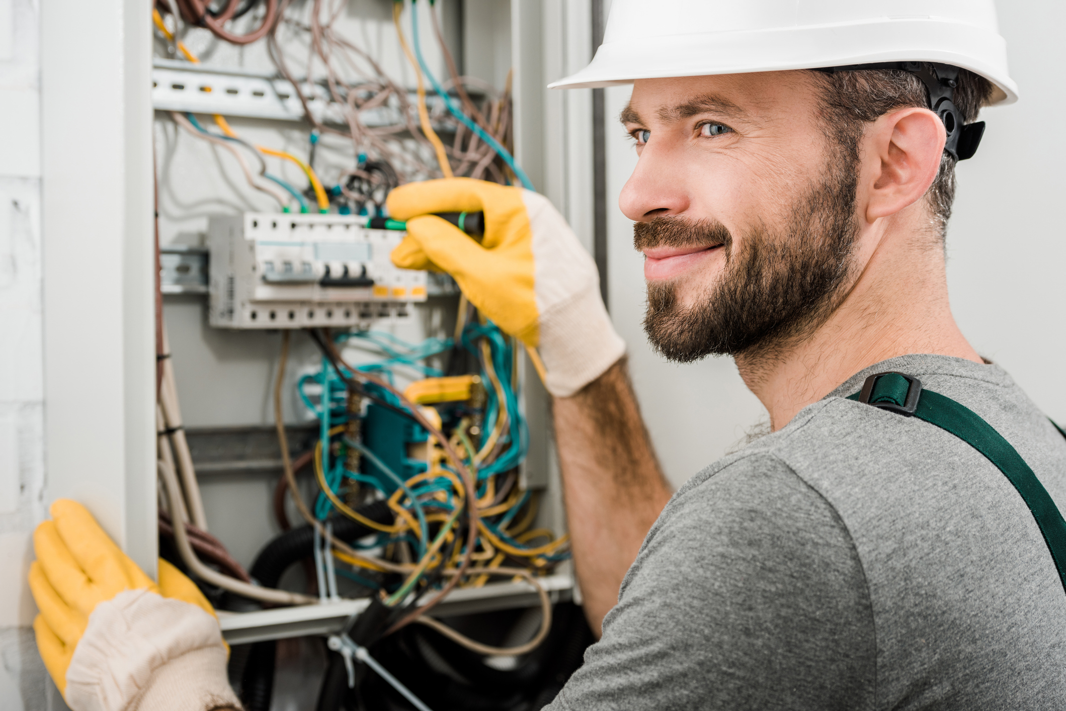 Cheerful-Electrician-Repairing