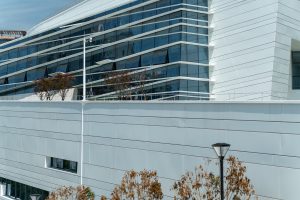 close up view of modern office building exterior with detail…