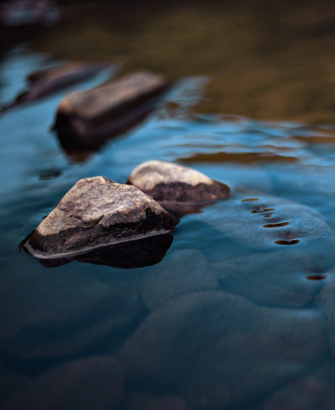 Rocks-In-Slow-Running-Stream-e1733169557680