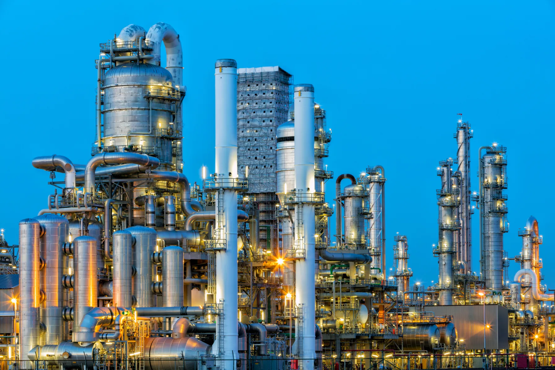 Petrochemical-Plant-Illuminated-at-Dusk-514620986-1