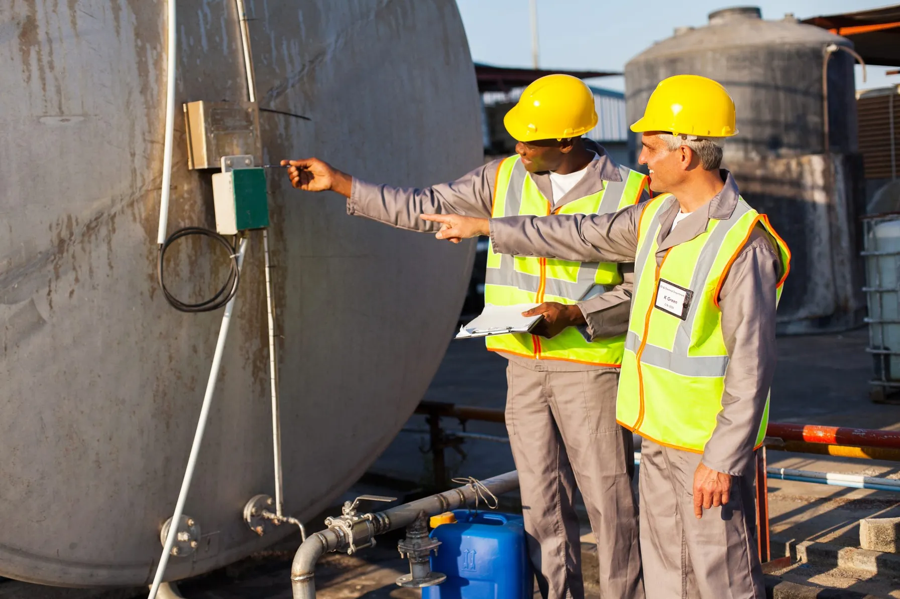 industrial-engineers-inspecting-fuel-tank
