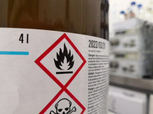A close up of a hazard warning on a cylinder