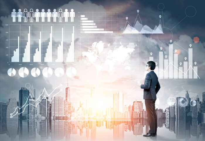 businessman-looking-at-data-scaled