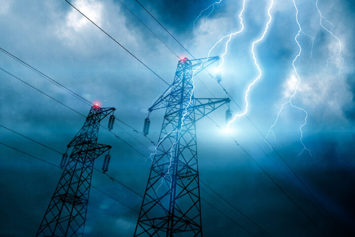 Storm lightning hitting powerline tower